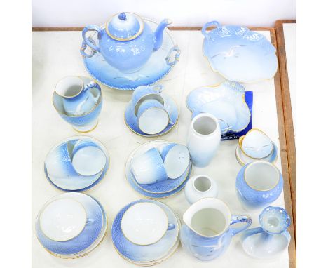 A BING AND GRONDAHL SHELL MOULDED BONE CHINA TEA SERVICE AND MATCHING ORNAMENTAL WARE, OF SHELL MOULDED FORM AND DECORATED WI
