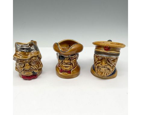 Glossy jugs with silver overlay accents. Lot includes Old Gaffer with pipe in his mouth 3.5"H, Pirate with patch on his eye a