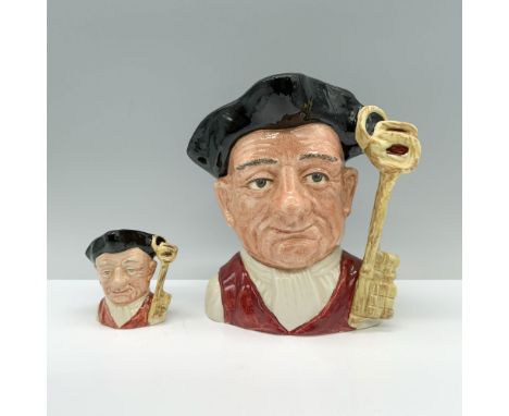 A pair of jugs depicting a colonial man in a red vest, white shirt, and black hat wields a set of keys as a handle in a minia