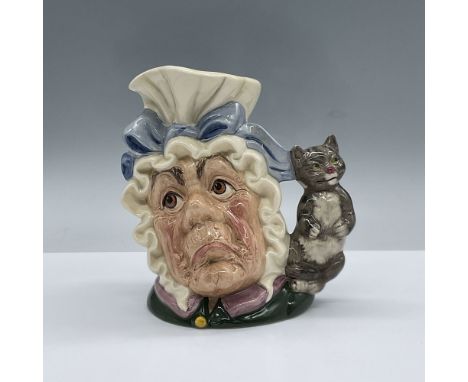 White mob cap trimmed with a blue bow. Royal Doulton backstamp. Artist: William K. HarperIssued: 1990 - 1991Dimensions: 7"HMa