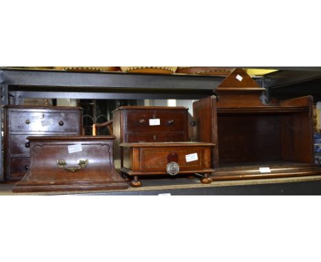 Mahogany wall shelf and various drawer sections,