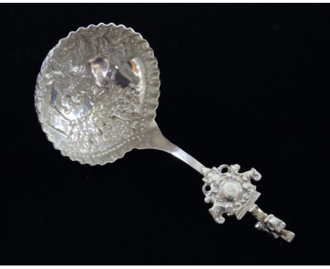Dutch silver caddy spoon embossed with a figure on horseback and squirrel finial, 1oz, 32g,
