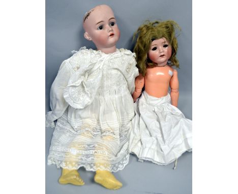 K„mmer & Reinhardt / Simon & Halbig bisque headed doll, mould No 66. Simon & Halbig bisque headed doll mould No 275, a compos