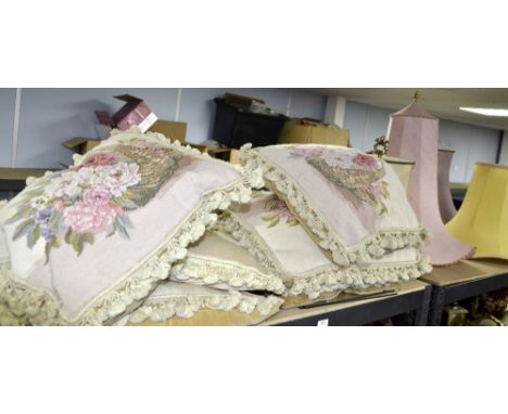Collection of embroidered cushions and lamp shades