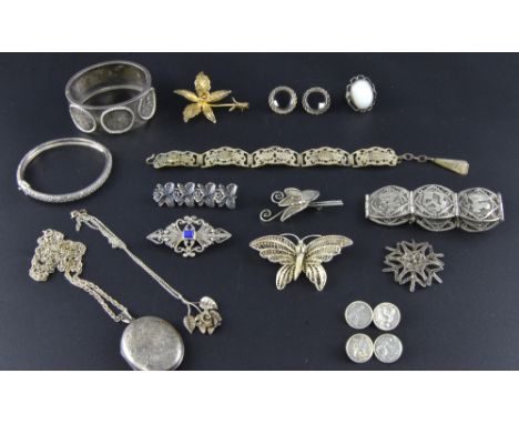A quantity of Victorian silver and other white metal jewellery to include locket, bangle etc.