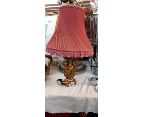 A cherub table lamp with shade COLLECT ONLY 