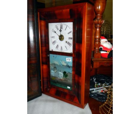 An American oak cased wall clock in working order, COLLECT ONLY. 