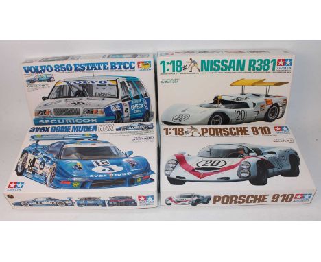 Four various boxed Tamiya 1/24 scale plastic race car kits to include an Avex Dome Mugn NSX race car, a Volvo 850 estate BBTC