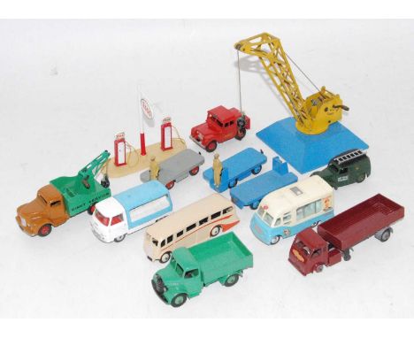 Dinky group of 12+ models and accessories as follows: 3x14a B.E.V trucks,752 goods yard crane, Esso pumps,255 Mersey tunnel L