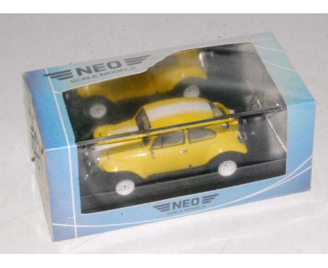 A Neo Scale Models 1/43 scale  model of a Baja Bug finished in yellow and green, Ref. No. NEO45896, appears as issued