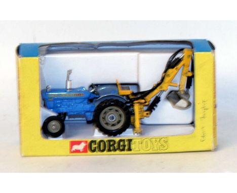 A Corgi Toys No. 72 Ford 5000 Super Major tractor with trenching bucket, housed in the original plastic tray window box (wind
