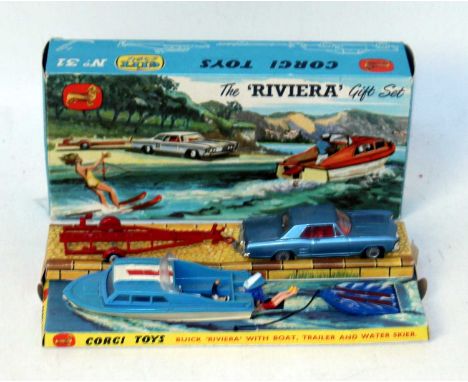 A Corgi Toys Gift set No. 31 Buick Riviera with Dolphin 20 cabin cruiser and Brooklands trailer, complete with water skiier a