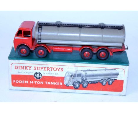 A Dinky Toys No. 504 Foden 14 ton tanker, comprising of first type red cab and chassis with grey back and red Supertoy wheels