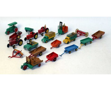 A collection of loose playworn and repainted Dinky Toy farming interest diecasts, mixed examples to include Massey Harris tra