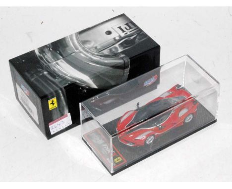 A BBR Models limited edition release Abu Dhabi 2014 No.10 Ferrari FXXK race car finished in red, limited edition No. 526/700 