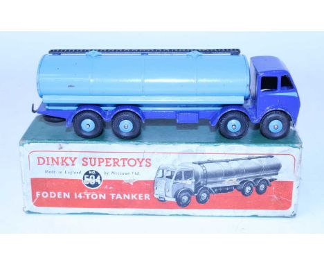 A Dinky Toys No. 504 Foden 14 ton tanker comprising of first type violet blue cab and chassis with light blue side flash, lig