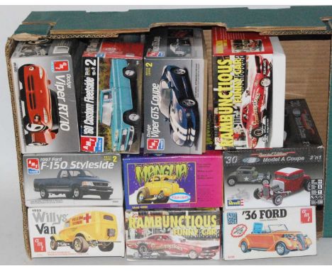 Ten various boxed Revell, AMT and Polar Lights 1/25 scale plastic sports car and race car kits to include an AMT 1933 Willie'