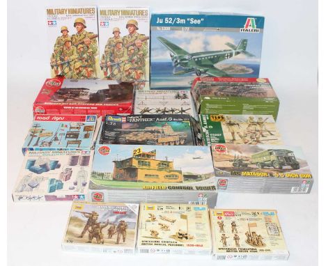 One tray containing 16 various mixed scale boxed plastic military kits to include Airfix, Tamiya, Revell and others, examples