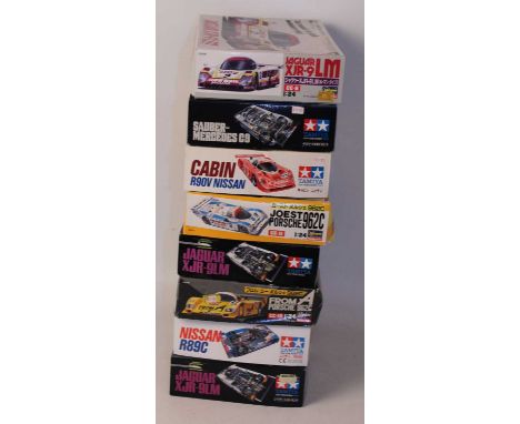 Eight various boxed 1/24 scale plastic high speed racing and sports car kits to include a Nissan R89C by Tamiya, a Tamiya Sau