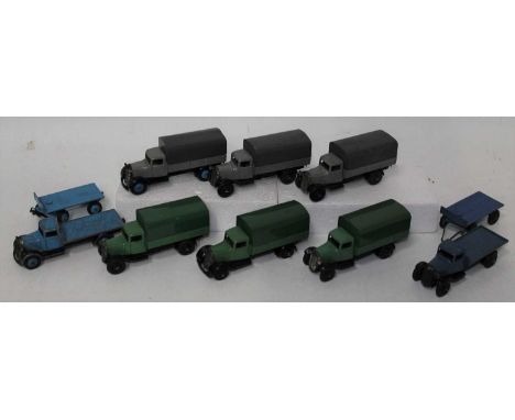 A Dinky Toys 25 Series wagon and covered wagon diecast group, eight examples, six fitted with canopies and the others without