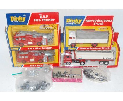 Dinky group of models to include 940 Mercesdes truck boxed in near mint box, 2x 266 E.R.F fire engine both boxes have tears t