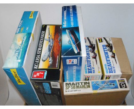 Six various mixed scale boxed as issued military aircraft and sea related plastic kits to include an AMT KC-135A Strato Tanke