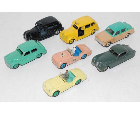 Dinky group lot of 7 models as follows: 2x Austin taxi,one black with late hubs ,other one in yellow with yellow hubs, Hillma