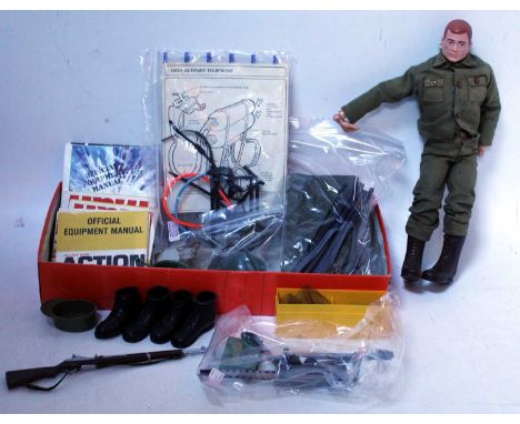 A Palitoy Action Man vintage painted head soldier, appears complete with green uniform, brown boots, rifle, helmet, ammunitio