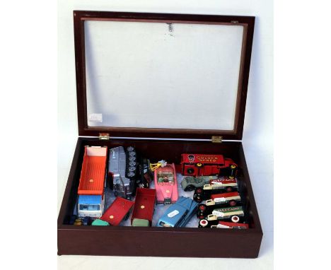 A Dinky Toys loose repainted and playworn diecast group to include a Robertsons Golden Shred delivery lorry, a Dinky Toys pre