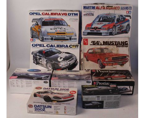 Eight various boxed mixed scale Tamiya AMT Mini Craft and Airfix Classic Car saloons, and sports car plastic kits to include 