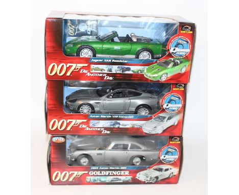 A James Bond 007 RC2 1/18 scale diecast group, three boxed as issued examples to include a Die Another Die Aston Martin V12 V