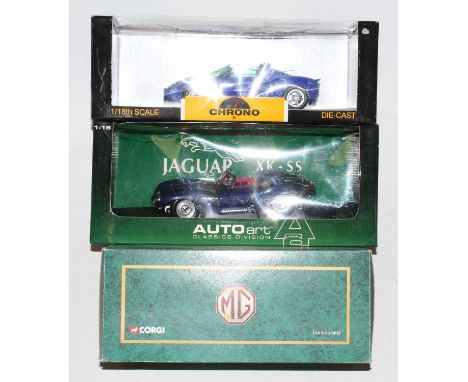 A 1/18 scale boxed diecast group, three boxed as issued examples to include a Corgi Toys 1/18 scale MGF, an Auto Art Race Div