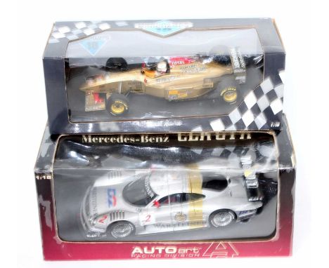 An Auto Art and Minichamps 1/18 scale race car group to include a Minichamps 18 model No. 960012 a Jordan Peugeot Martin Brun