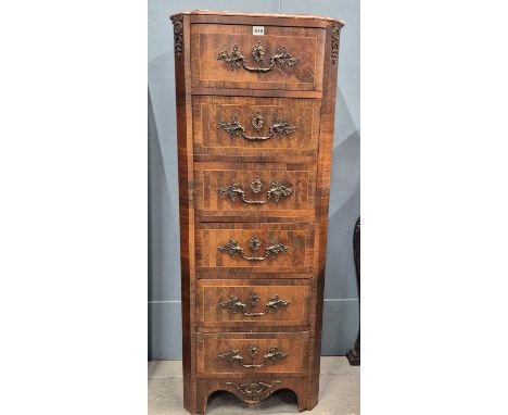 A French rosewood secretaire a battant, with a drawer above the fall and three below each with brass handles with foliate ter