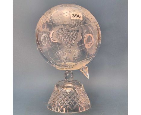 A cut and frosted glass terrestrial globe.   H 30cms.