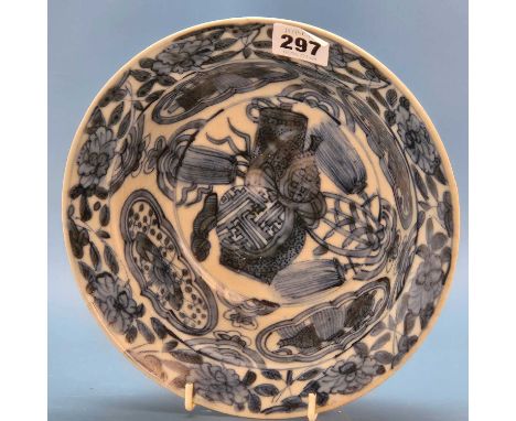 A Zhanzhou blue and white klapsmut, the central tasselled gourd and fan enclosed by four ruyi shaped panels on the cavetto an
