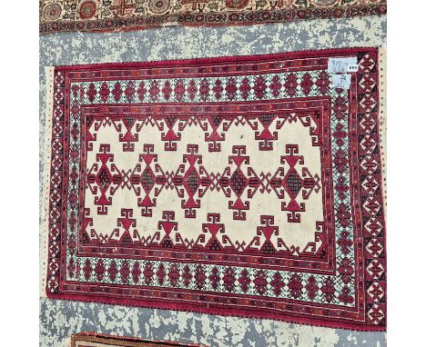 A Persian tribal rug 128 x 92cm