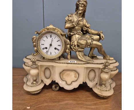 An alabaster and gilt spelter mantel clock countwheel striking on a bell, a renaissance man seated to one side of the circula