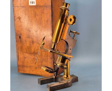 An Antique W. Watson &amp; Sons (High Holborn, London) Brass Monocular microscope, cased with numerous spare objective lenses