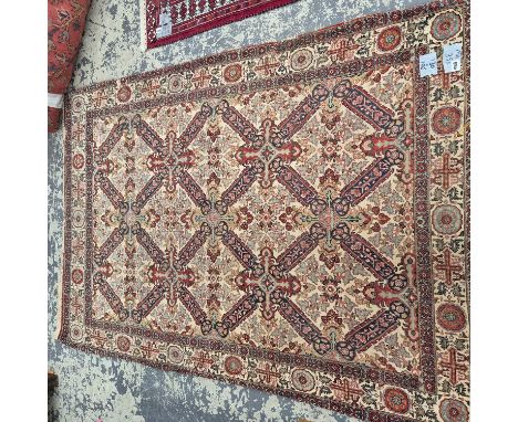 A finely woven Persian rug of Caucasian design 196 x 130 cm