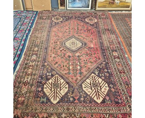 A Persian tribal carpet 315 x 195 cm