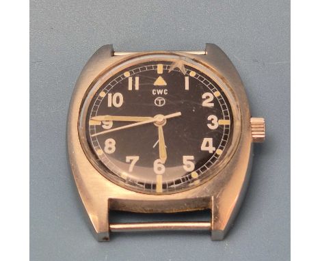 A CWC (Cabot Watch Company) MIlitary wrist watch. Black dial with luminous arabic numerals and white broard arrow mark. The c