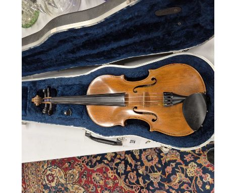 A German violin labelled for Stradivarius, the back.36cms. the overall length. 60cms. contained in modern transit case