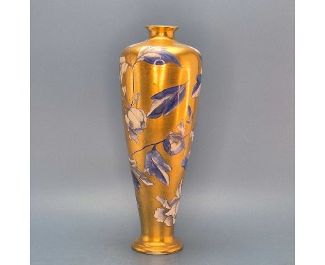 A Macintyre style vase decorated in blue with peonies on a gilt ground.   H 30cms. together with a Maling gilt handled bowl. 