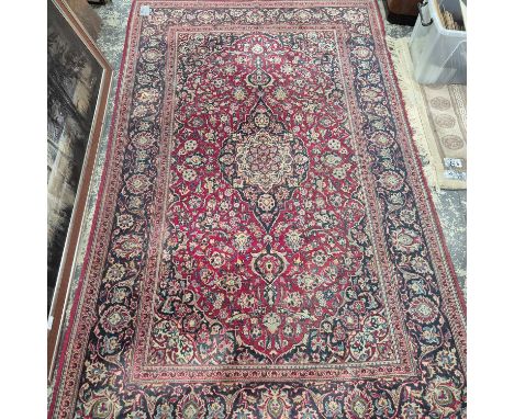A Persian Kashan rug. 217 x 137 cm. 