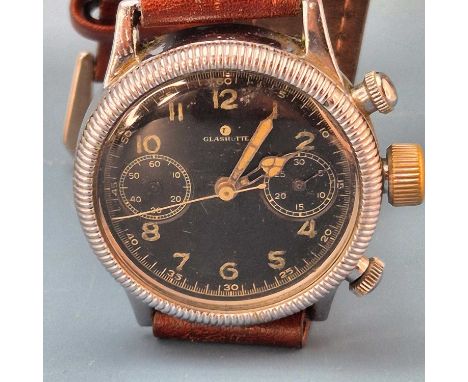 A Rare Glashutte Tutima Chronograph wrist watch. black dial with luminous arabic numerals and hands. chromed and stainless st