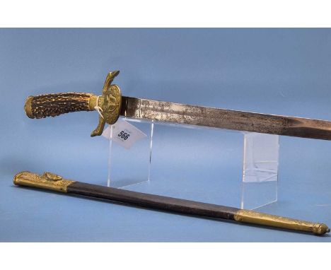 A stag's horn handled hunting knife by Schurmann, the black leather scabbard with foliate gilt brass mounts, the single edged