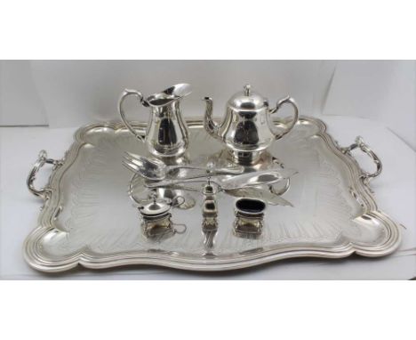 A "CHRISTOFLE" FRENCH SILVER PLATED TWO-HANDLED TEA TRAY, the handles cast acanthus scroll design, the base 58cm x 47cm, a "C