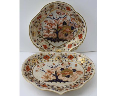 TWO 19TH CENTURY CROWN DERBY CERAMIC DISHES, painted and gilded in the Imari palette, one heart shaped, the other a single ha