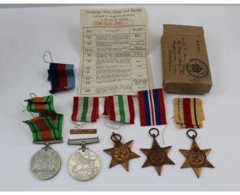 A COLLECTION OF FIVE SECOND WORLD WAR MILITARY MEDALS, with ribbons in original card box, includes the Italy star and the Afr